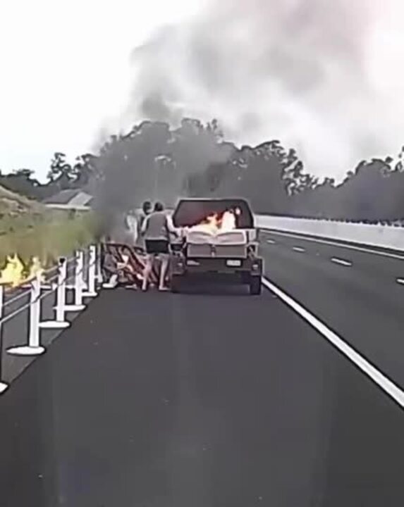 Samaritan helps as car bursts into flames on Bruce Highway