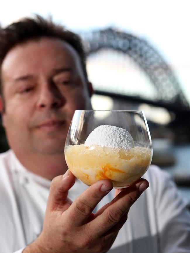 Peter Gilmore with his famous Snow Egg dessert at Quay Restaurant. Picture: Kristi Miller