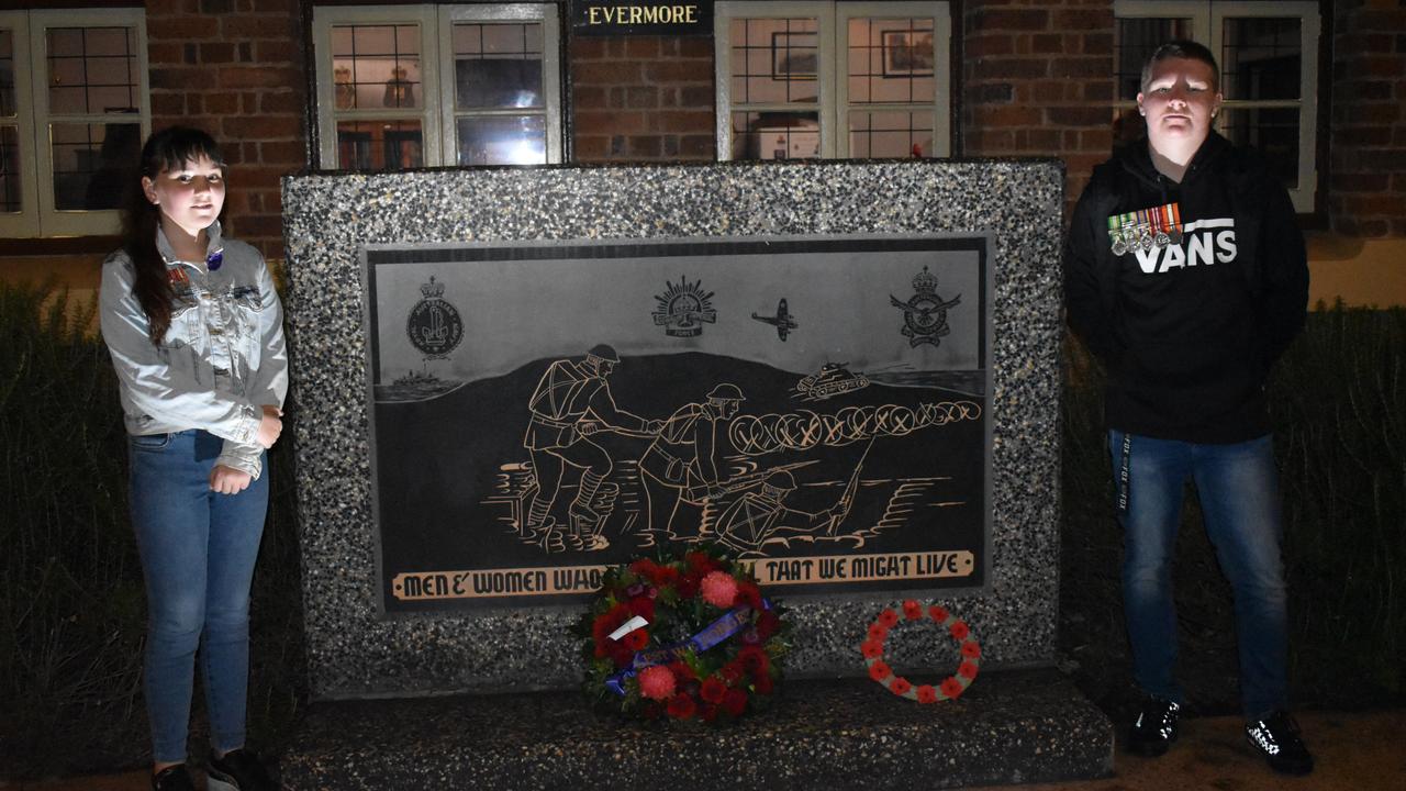 Ipswich residents Zarah and Cohen Le Boydre wearing their dad's medals at the 2022 Ipswich Anzac Day Dawn Service. Picture: Jessica Baker