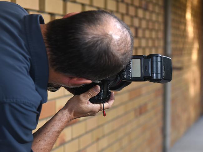 Photographer Steve shows the angle from which the viral photograph was taken. Picture: AAP/John Gass