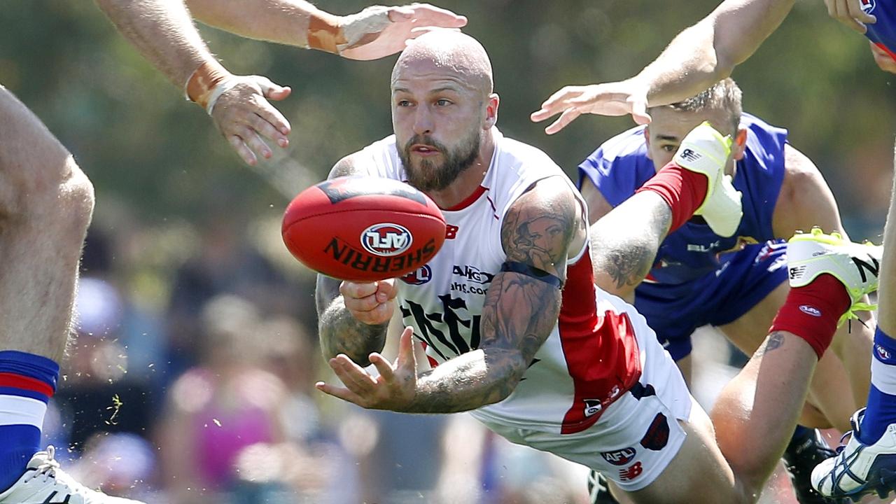 NAB Challenge. Western Bulldogs vs Melbourne at Highgate Recreation Reserve, Craigieburn. Nathan Jones by hands out of the middle . Pic: Michael Klein