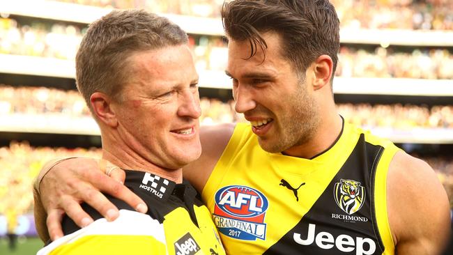 Damien Hardwick celebrates with Alex Rance after the Grand Final.