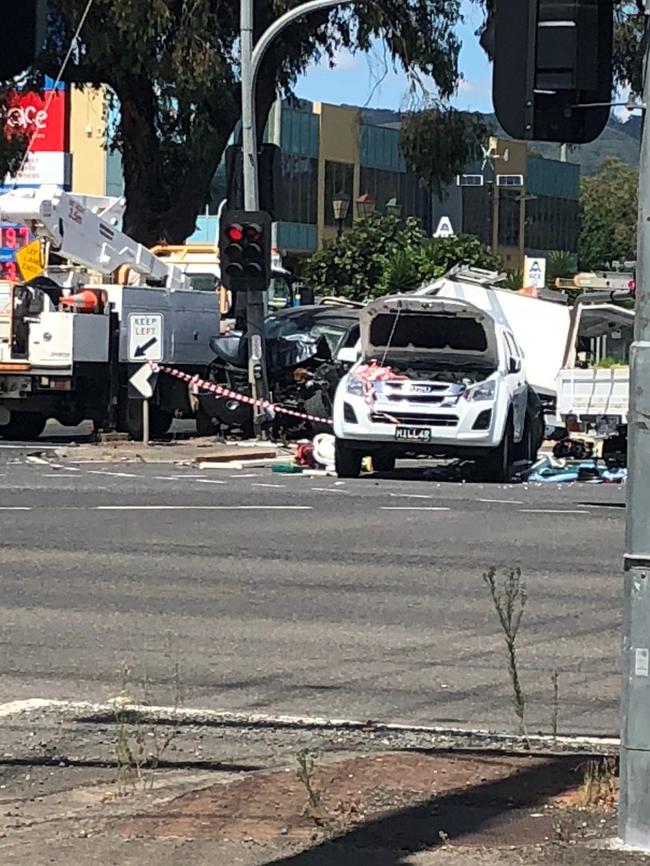 A white 4WD ute is also smashed up. Picture: Blair Corless