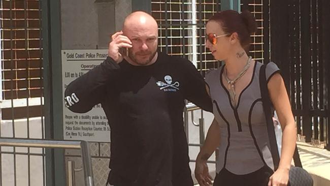 Hells Angels bikie Samuel King leaves Southport Watchhouse with his partner. Picture: Jack Harbour.