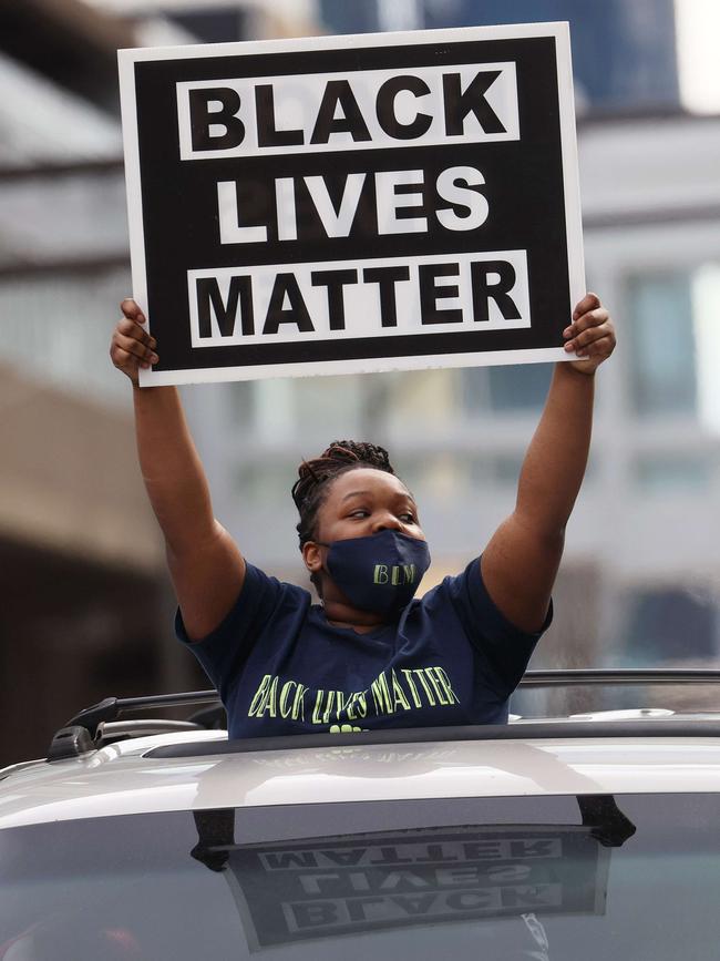 MINNEAPOLIS, MINNESOTA - APRIL 20: A person reacts after the verdict was read in the Derek Chauvin trial on April 20, 2021 In Minneapolis, Minnesota.Â Former police officer Derek Chauvin was on trial on second-degree murder, third-degree murder and second-degree manslaughter charges in the death of George Floyd May 25, 2020.Â  After video was released of then-officer Chauvin kneeling on Floydâs neck for nine minutes and twenty-nine seconds, protests broke out across the U.S. and around the world. The jury found Chauvin guilty on all three charges.   Scott Olson/Getty Images/AFP == FOR NEWSPAPERS, INTERNET, TELCOS & TELEVISION USE ONLY ==