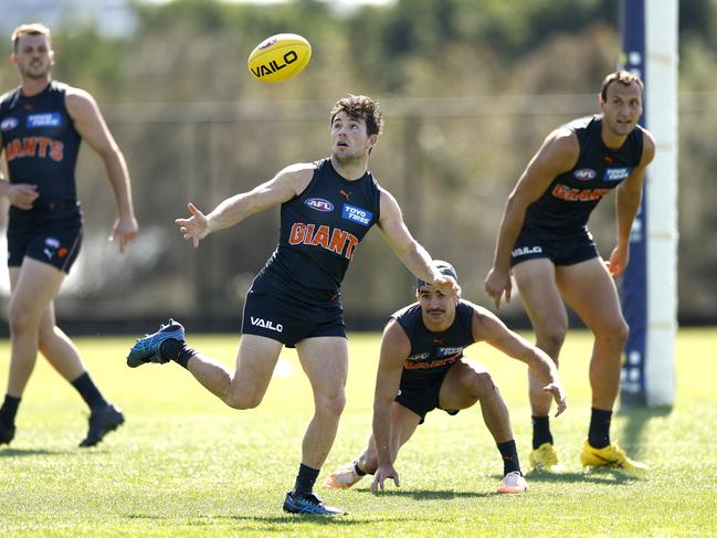 Daniels contests for the ball at Giants training. Picture: Phil Hillyard