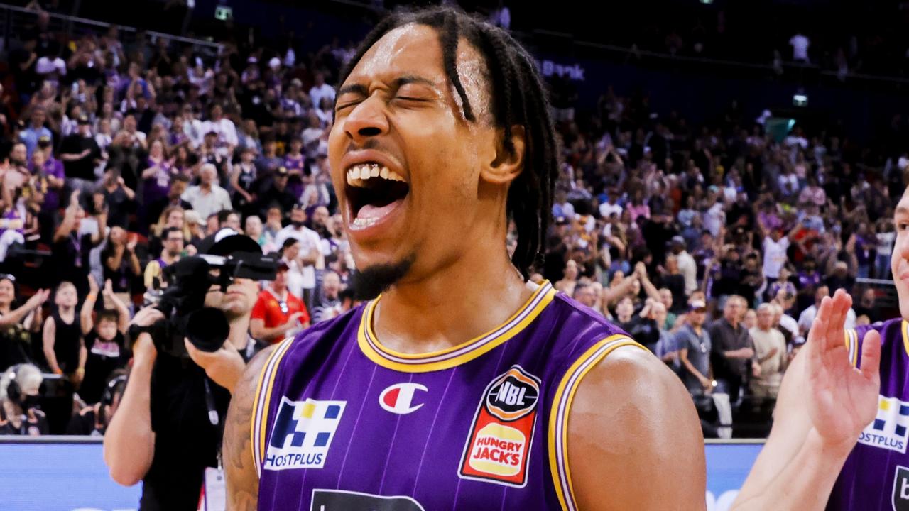 Jaylen Adams roars with delight after the Kings booked their spot in the NBL grand final. Picture: Getty Images)