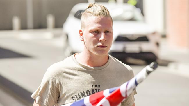 Alleged neo Nazi Nathan Bull leaves the Adelaide Magistrates court.