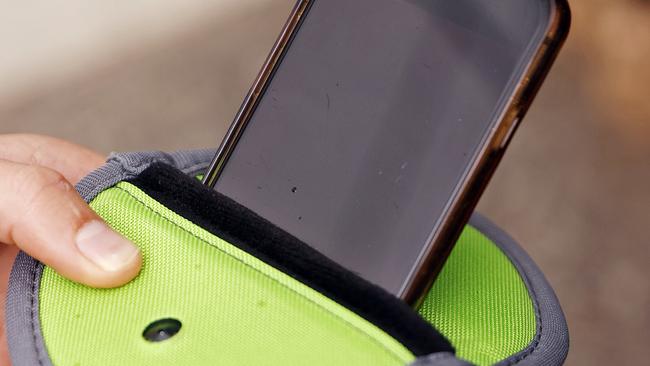 Some schools will implement a pouch system to keep phones out of students hands during school hours. Picture: Sam Ruttyn