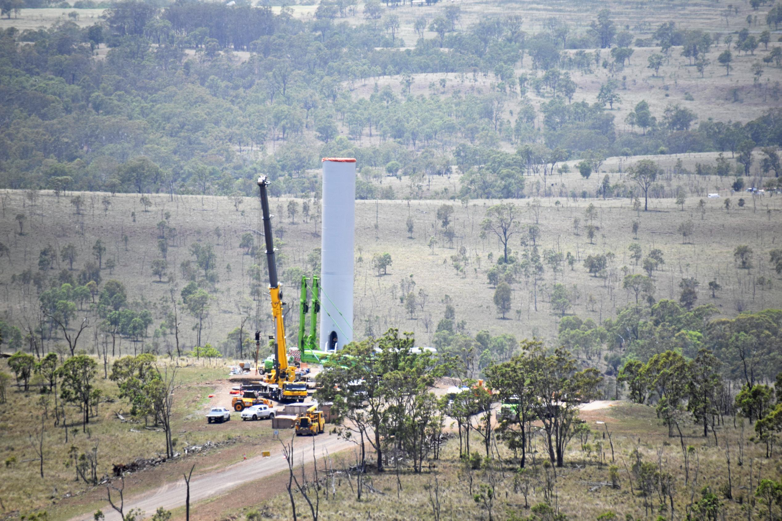 Base tower one of the 123 wind turbines is erected at Coopers Gap. Picture: Matt Collins