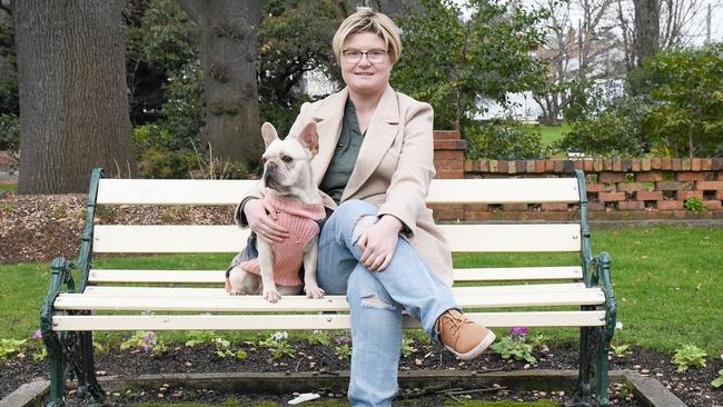 Jess Hoyle with French bulldog Pandora. She was refused an exemption to allow her to host Lesbian, Gay and Bisexual Alliance events that excluded anyone who was born male. Picture: Alex Treacy