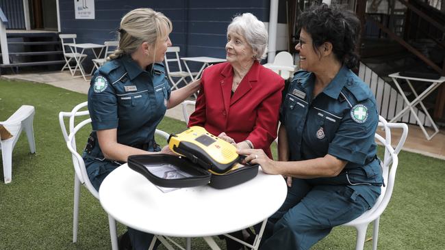 QVikki Harvey, 50, and Beverly Geronimos, 59, are volunteer paramedics, who are on-call whenever they are home on Coochiemudlo Island. Denise Foley (centre), at the Curlew Cafe (where a defibrillator is kept) - local real estate agent - was the original first responder. Picture: Mark Cranitch.