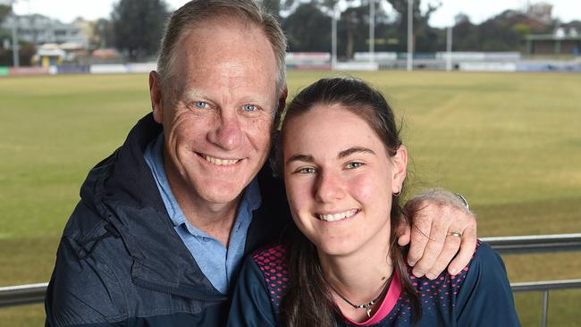 St Kilda legend Nathan Burke with daughter Alice who is tipped to be a future AFLW star for her father’s club. Picture: Josie Hayden