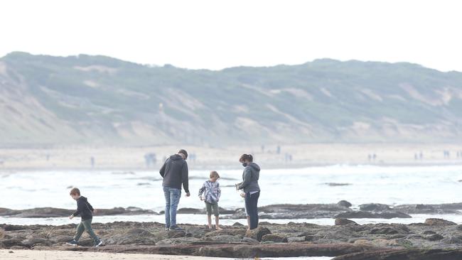 Beach walks proved popular for families at Ocean Grove during a recent Covid lockdown. Picture: Alan Barber