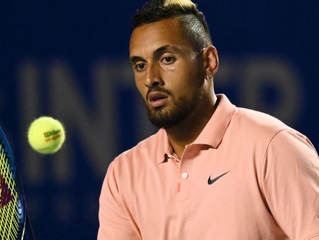 Australia's Nick Kyrgios hits the ball during his Mexico ATP Open 500 men's singles tennis match against France's Ugo Humbert in Acapulco, Guerrero State, Mexico on February 25, 2020. (Photo by PEDRO PARDO / AFP)