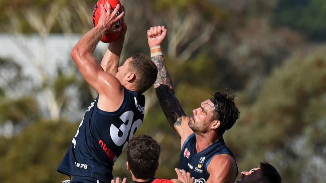 10/04/16 - SANFL: South Adelaide v West Adelaide at Noarlunga. Souths' Alex Cailotto takes a strong grab. Photo Tom Huntley