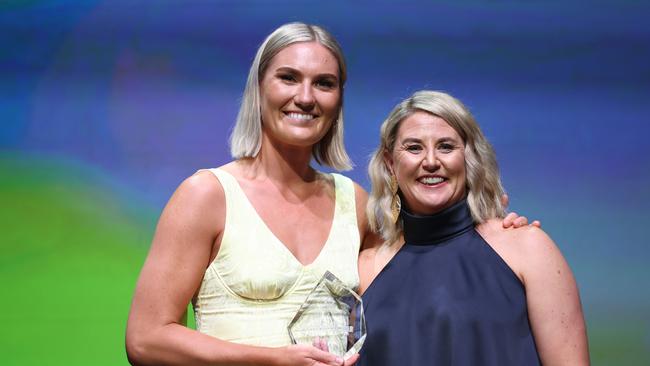 MELBOURNE, AUSTRALIA - NOVEMBER 25: Courtney Bruce (L)  poses with Stacey Marinkovich after receiving the Australian International Player of the Year award during the 2023 Australian Netball Awards at The Forum on November 25, 2023 in Melbourne, Australia. (Photo by Graham Denholm/Getty Images)