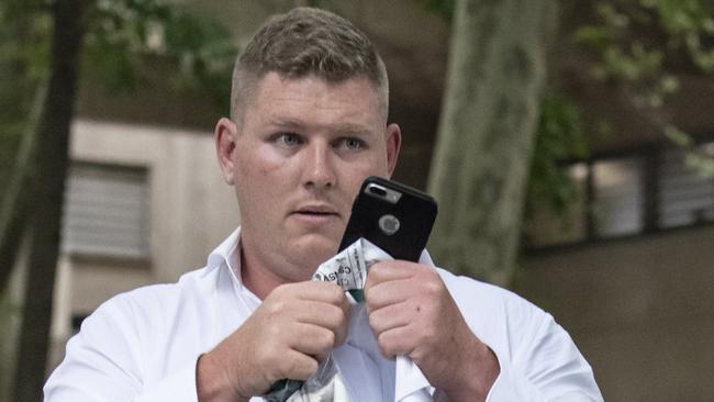 Blake Osgood exiting Surry Hills Police Station after he was released on bail. Picture: Monique Harmer