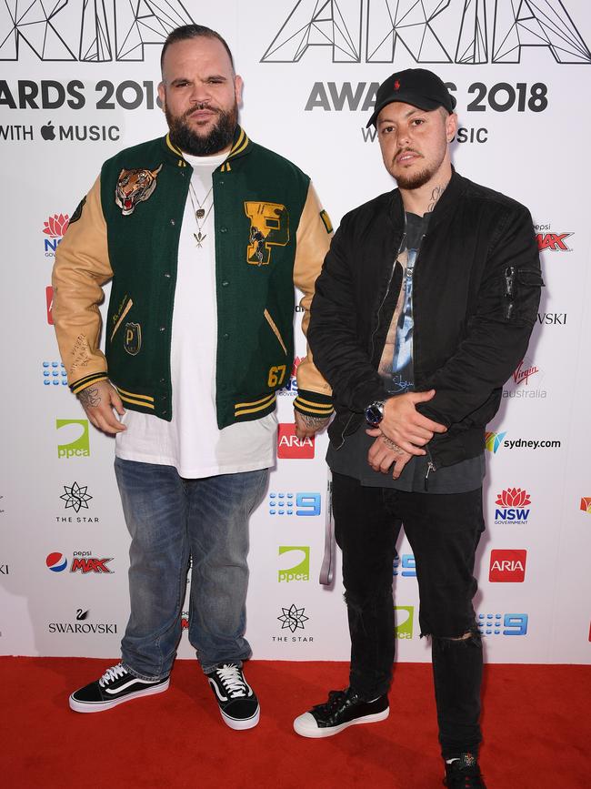 Hip hop artists Briggs and Trials from A.B were unafraid to show off an unconventional red carpet look Original. Picture: AAP