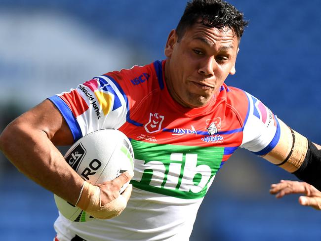 GOLD COAST, AUSTRALIA - APRIL 21: Jesse Ramien of the Knights breaks away from the defence during the round 6 NRL match between the Titans and the Knights at Cbus Super Stadium on April 21, 2019 in Gold Coast, Australia. (Photo by Bradley Kanaris/Getty Images)