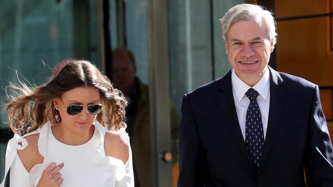 Michael Kroger leaving the court yesterday flanked by Carlie Boal. (David Geraghty/The Australian)