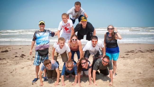 Phelps-Roper (bottom, second from right) with her parents Brent and Shirley and siblings (bar Josh) in Texas in 2012, less than six months before she left the Westboro Baptist Church. (Picture: Supplied)