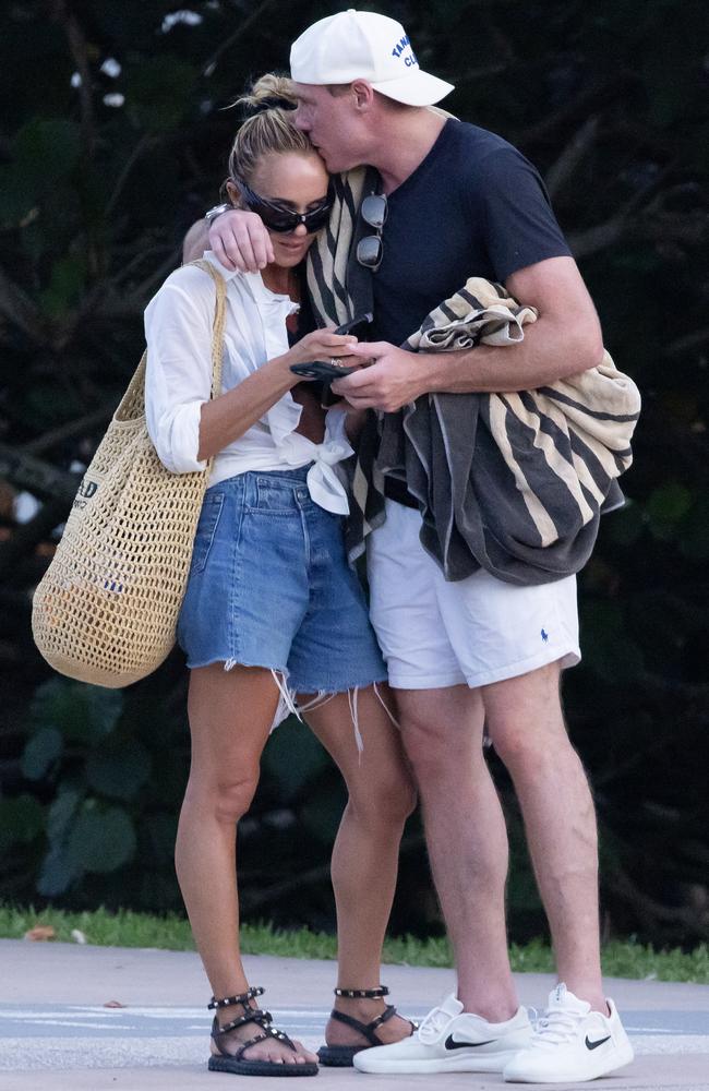 Designer Pip Edwards gets a smooch from new boyfriend Lachlan Thompson. Picture: Matrix