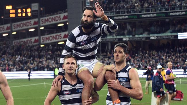 Jimmy Bartel is chaired off the field after playing his 300th career game.