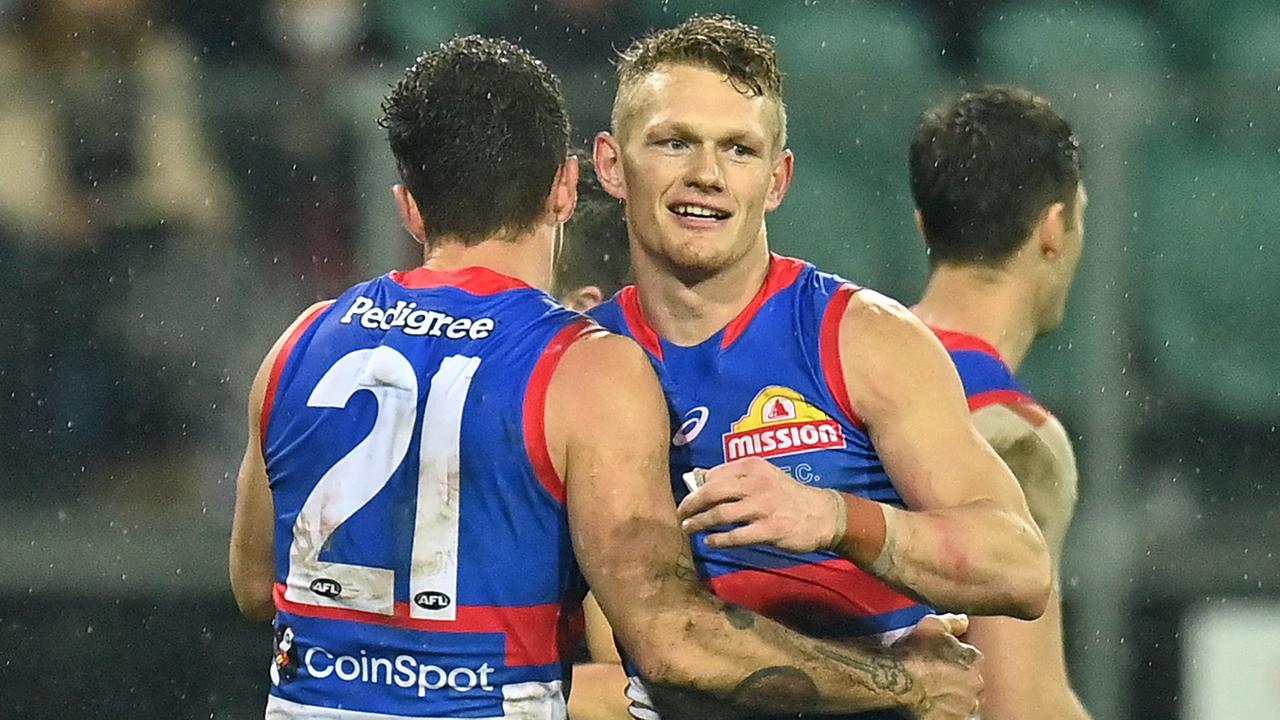 Tom Liberatore and Adam Treloar celebrate against Essendon. Picture: AFL Photos