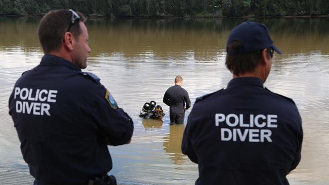 Police recover a car related to the investigation from the Georges River at the Floyds Bay Boat Ramp, Lansvale. Picture: NSW Police Force.