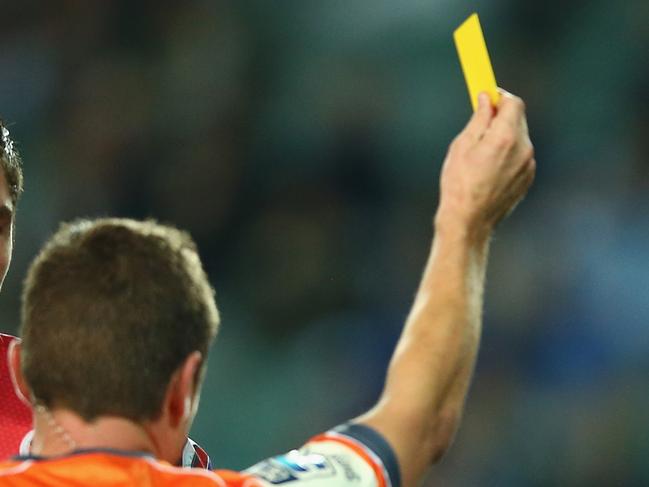 SYDNEY, AUSTRALIA - JUNE 13: Rob Simmons (L) and Adam Thomson (R) looks dejected as referee Nick Briant shows Thomson a yellow card during the round 18 Super Rugby match between the Waratahs and the Reds at Allianz Stadium on June 13, 2015 in Sydney, Australia. (Photo by Mark Kolbe/Getty Images)