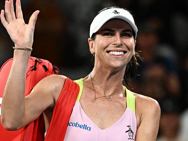 Australia's Ajla Tomljanovic waves as she leaves the court after victory against Croatia's Petra Martic in their women's singles match on day three of the Australian Open tennis tournament in Melbourne on January 17, 2024. (Photo by Lillian SUWANRUMPHA / AFP) / -- IMAGE RESTRICTED TO EDITORIAL USE - STRICTLY NO COMMERCIAL USE --