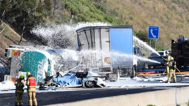 A petrol tanker has rolled onto vehicles on a Melbourne freeway. Picture: Jason Edwards