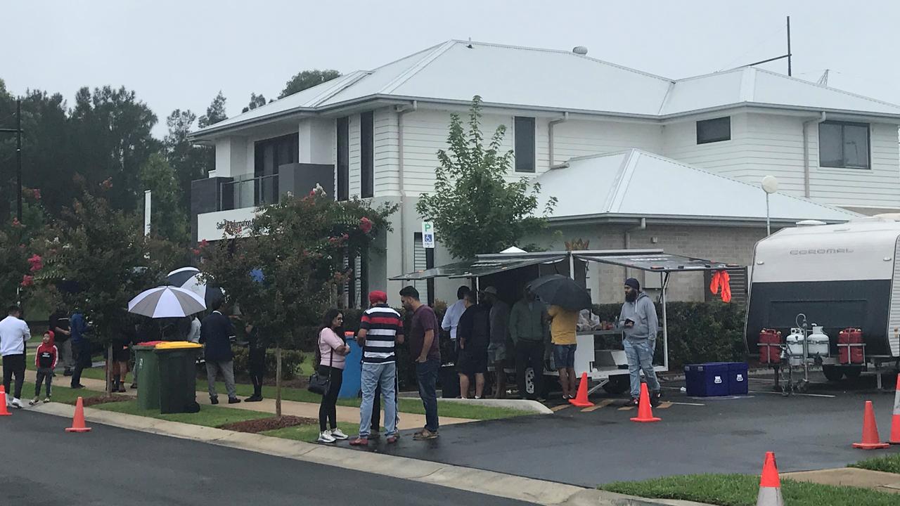 The market is so hot that people are camping out days to get land for homes in southwest Sydney.