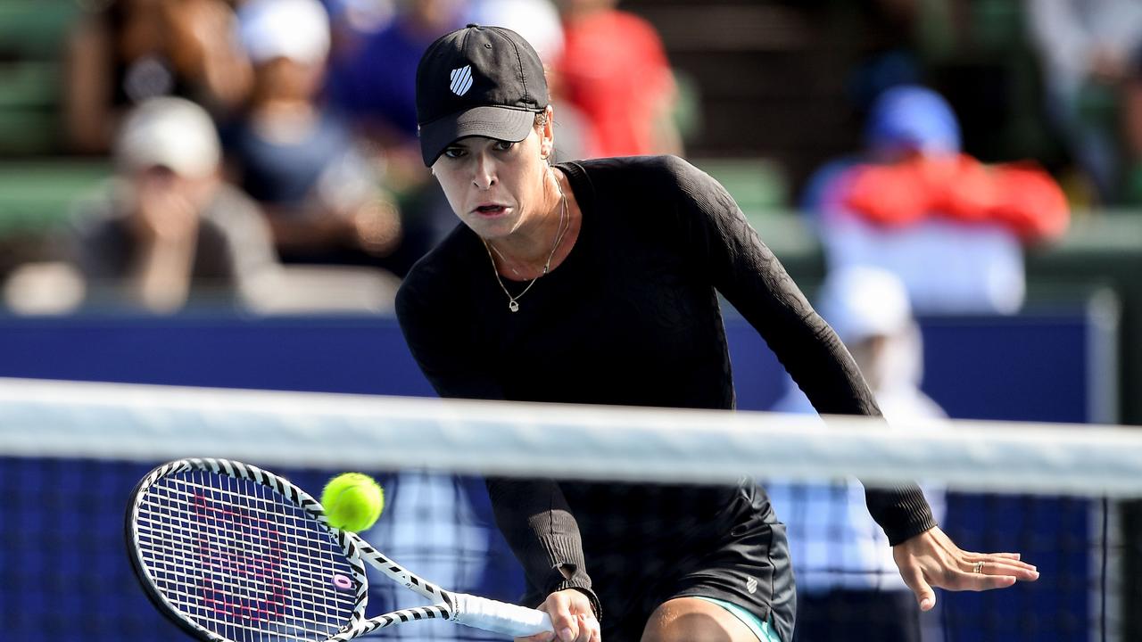 Ajla Tomljanovic hits a return against Maria Sharapova of Russia at the Kooyong Classic.