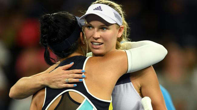 Wozniacki and Ahn embrace after their match. Picture: AAP