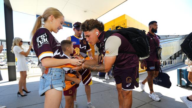 Walsh interacting with fans departing Brisbane for the NRL Grand Final. Photo: David Clark