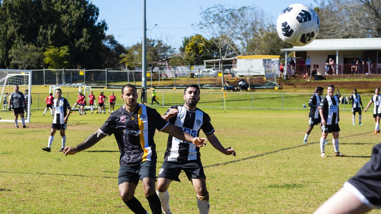 Joshua Spruill (left) of West Wanderers and Tahsin Hussein of Willowburn in U23 men FQ Darling Downs Presidents Cup football at West Wanderers, Sunday, July 24, 2022. Picture: Kevin Farmer