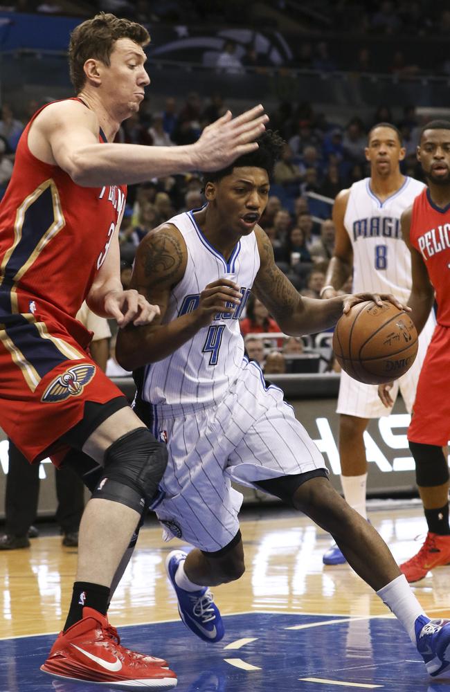 New Orleans Pelicans centre Omer Asik (3) blocks the path of Orlando Magic guard Elfrid Payton (4).