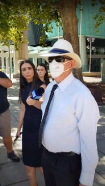 Robert Charles Warland leaves Adelaide Magistrates Court