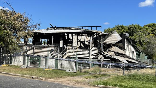 The scene of a house fire in Maryborough has been fenced off and police tape remains around the property.