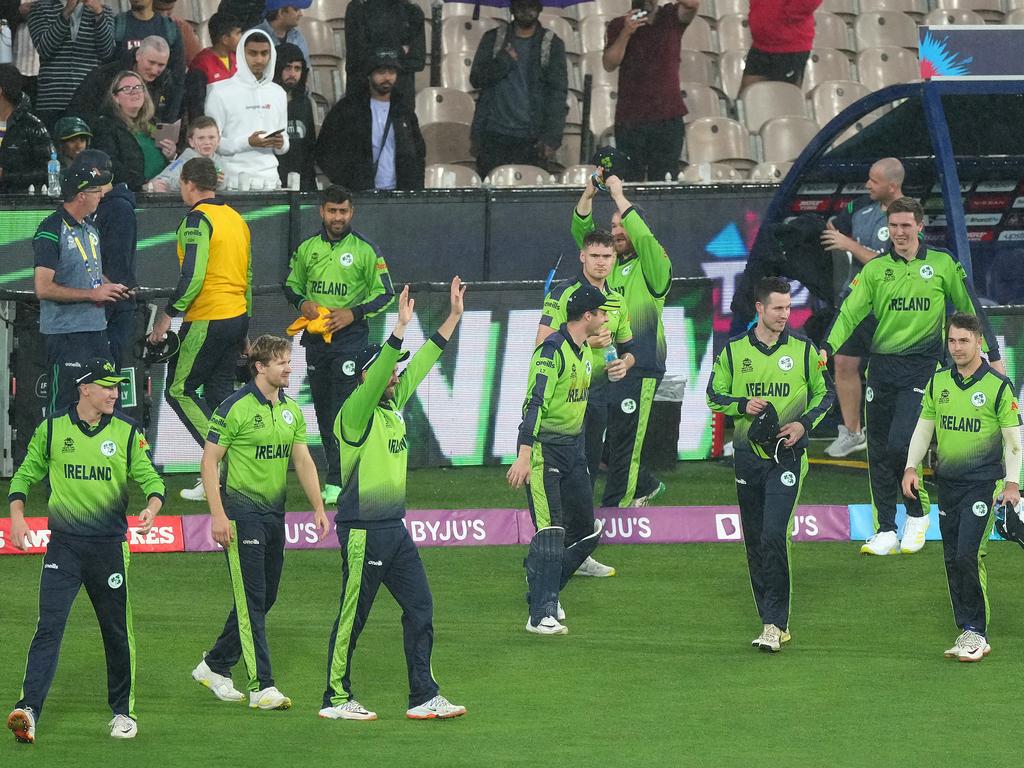 The Irish players celebrate as the rain tumbled at the MCG. Picture: Scott Barbour/PA Images via Getty Images