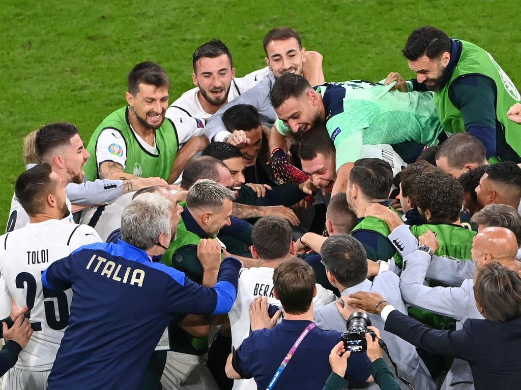 Italy, Spain through after pulsating victories