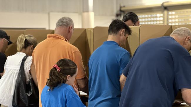 Voters including Phil Scott, Independent candidate for Solomon, arrive at the Parap Primary School to vote in the 2025 Federal Election on May 3, 2025. Picture: Fia Walsh