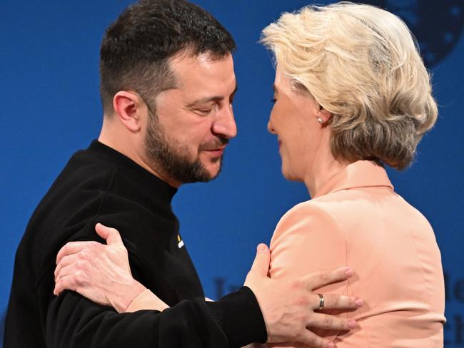 European Commission President Ursula von der Leyen and Ukraine's President Volodymyr Zelenskyy embrace during the award ceremony of the International Charlemagne Prize of Aachen 2023. Picture: AFP