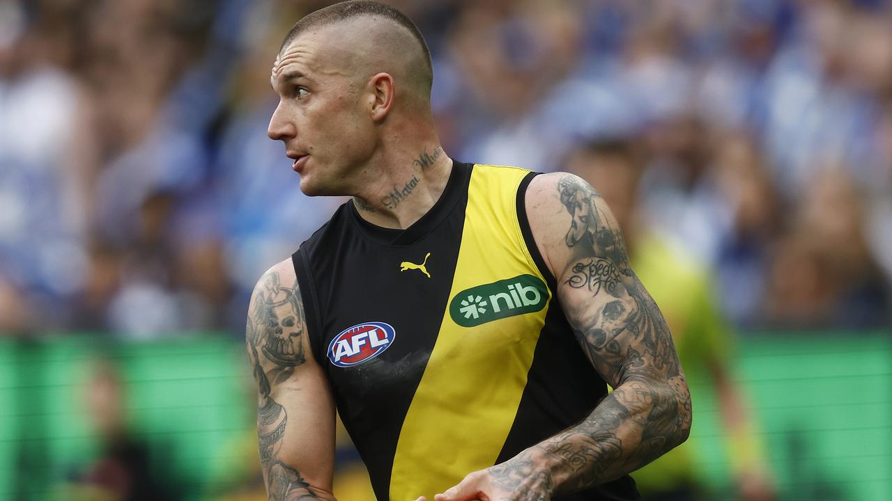 Dustin Martin of the Tigers looks to pass the ball during the round 23 AFL match between Richmond Tigers and North Melbourne Kangaroos at Melbourne Cricket Ground, on August 19, 2023, in Melbourne, Australia. (Photo by Daniel Pockett/Getty Images)