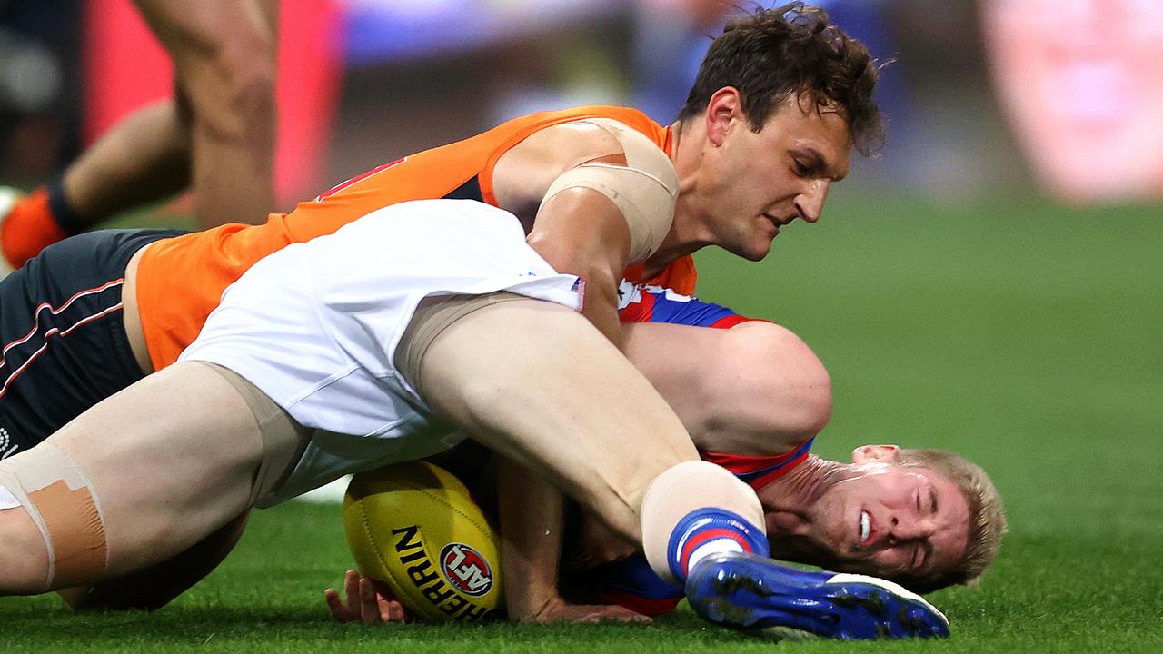 Giants big man Braydon Preuss was suspended for this dangerous tackle on Western Bulldogs opponent Tim English. Picture: Phil Hillyard