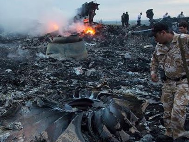 Soldiers at the horrific site of MH17’s deadly crash. Picture: Supplied
