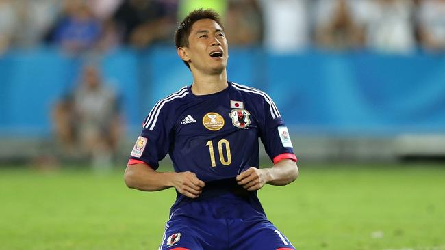 SYDNEY, AUSTRALIA - JANUARY 23: Shinji Kagawa of Japan reacts to missing a penalty during the 2015 Asian Cup Quarter Final match between Japan and the United Arab Emirates at ANZ Stadium on January 23, 2015 in Sydney, Australia. (Photo by Mark Metcalfe/Getty Images)