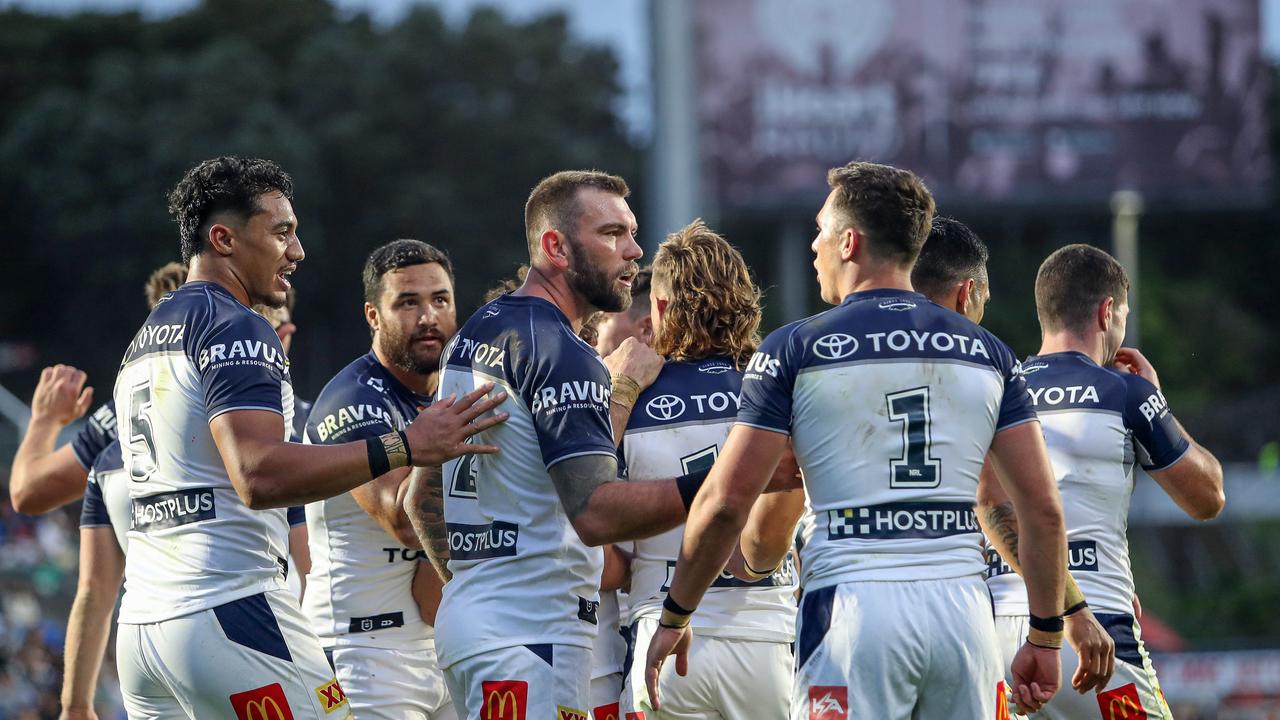 Cowboys players celebrate a try against the Warriors. Picture: NRL Photos